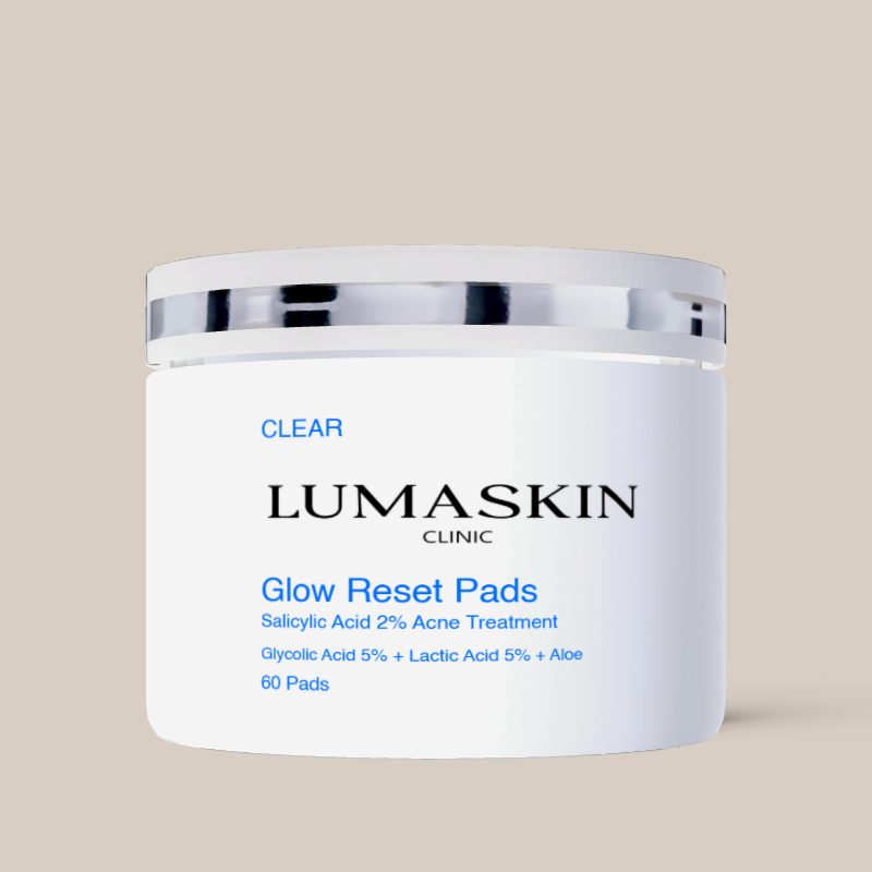 Lumaskin Clinic Glow Reset Pads container on a beige background